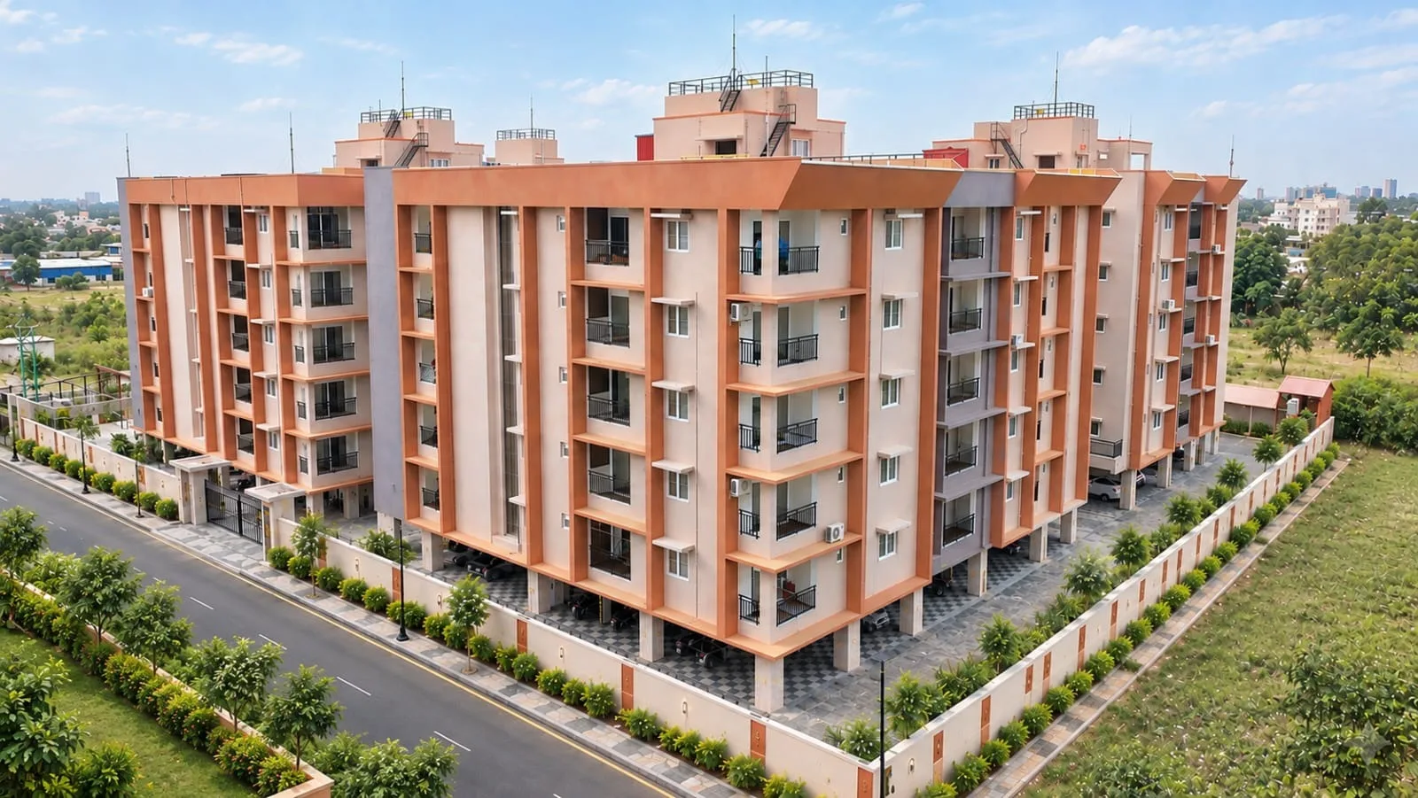 Utsav Hills towers beside the approach road in Thudiyalur, Coimbatore